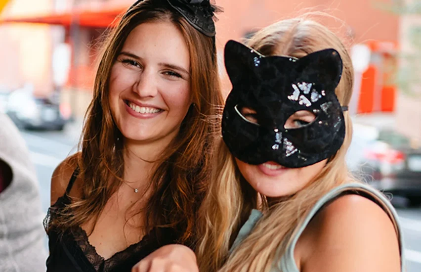 friends wearing costumes on party bike