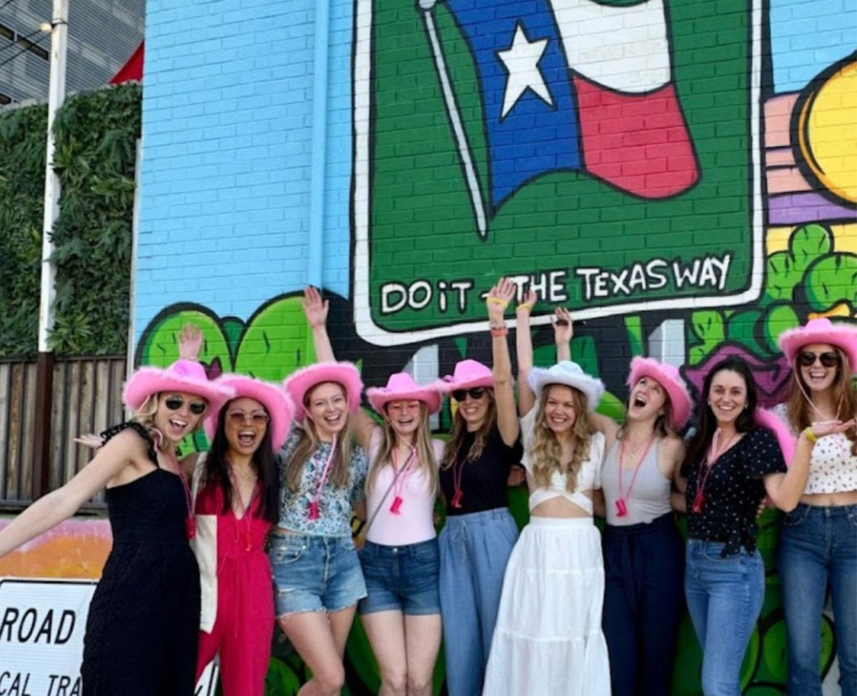 austin bachelorette party in front of mural