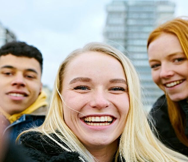 teenagers taking selfie