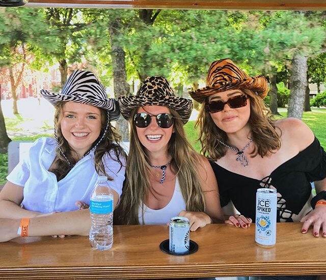 three ladies smiling for portrait
