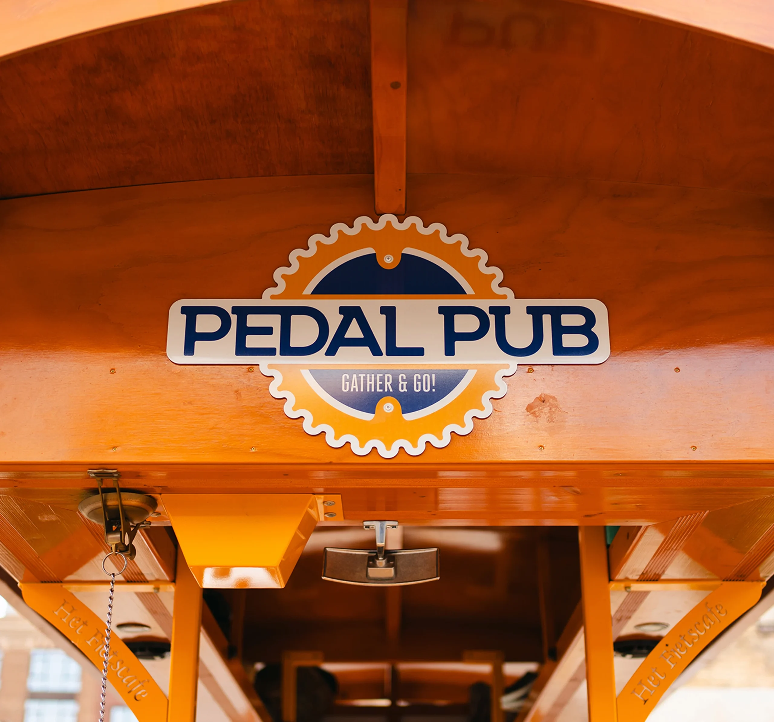 closeup of Pedal Pub logo on bike