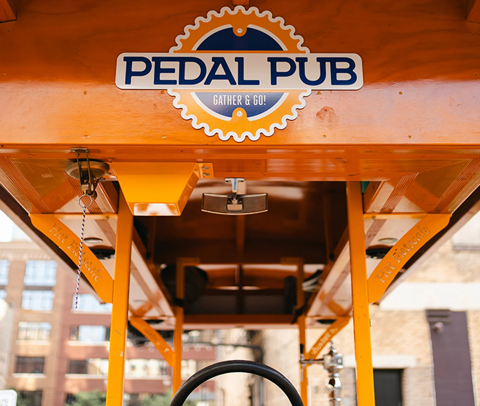 close up of Pedal Pub logo on bike