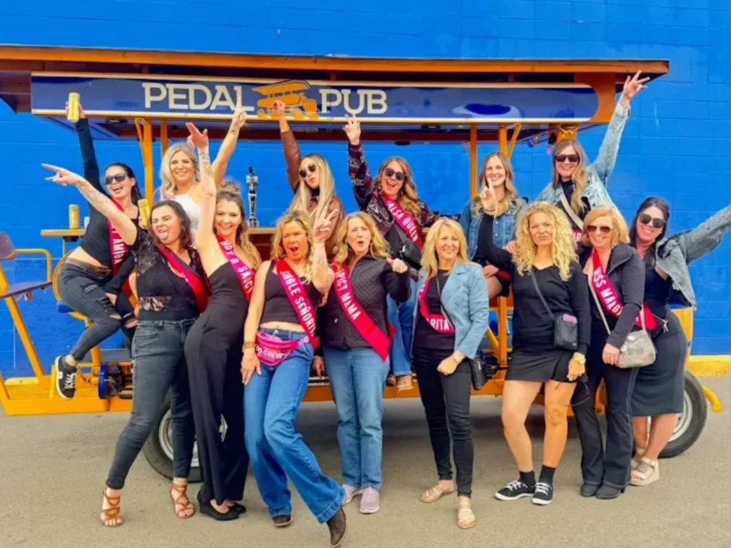 bachelorette party guests wearing sashes