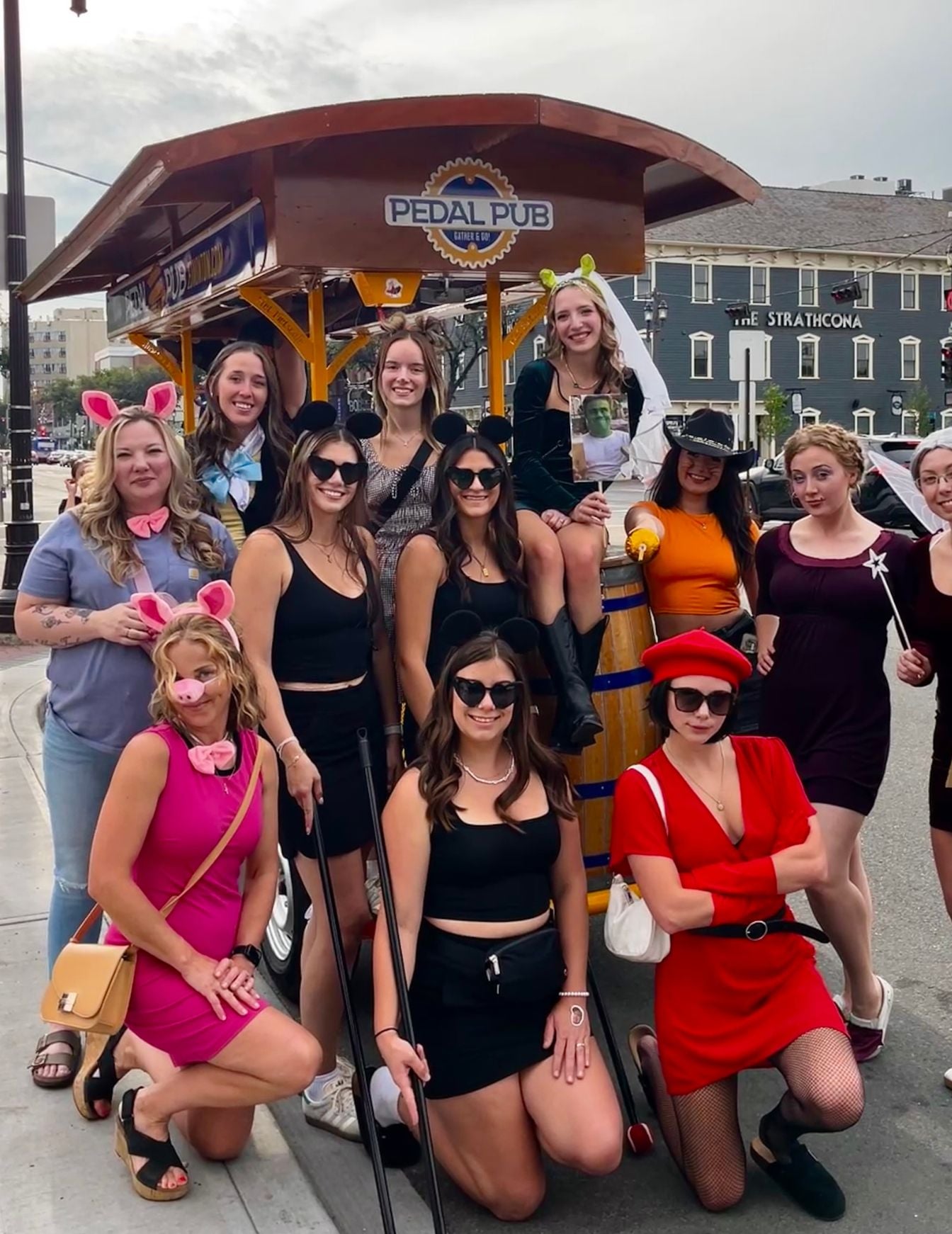 bachelorette party guests in costumes