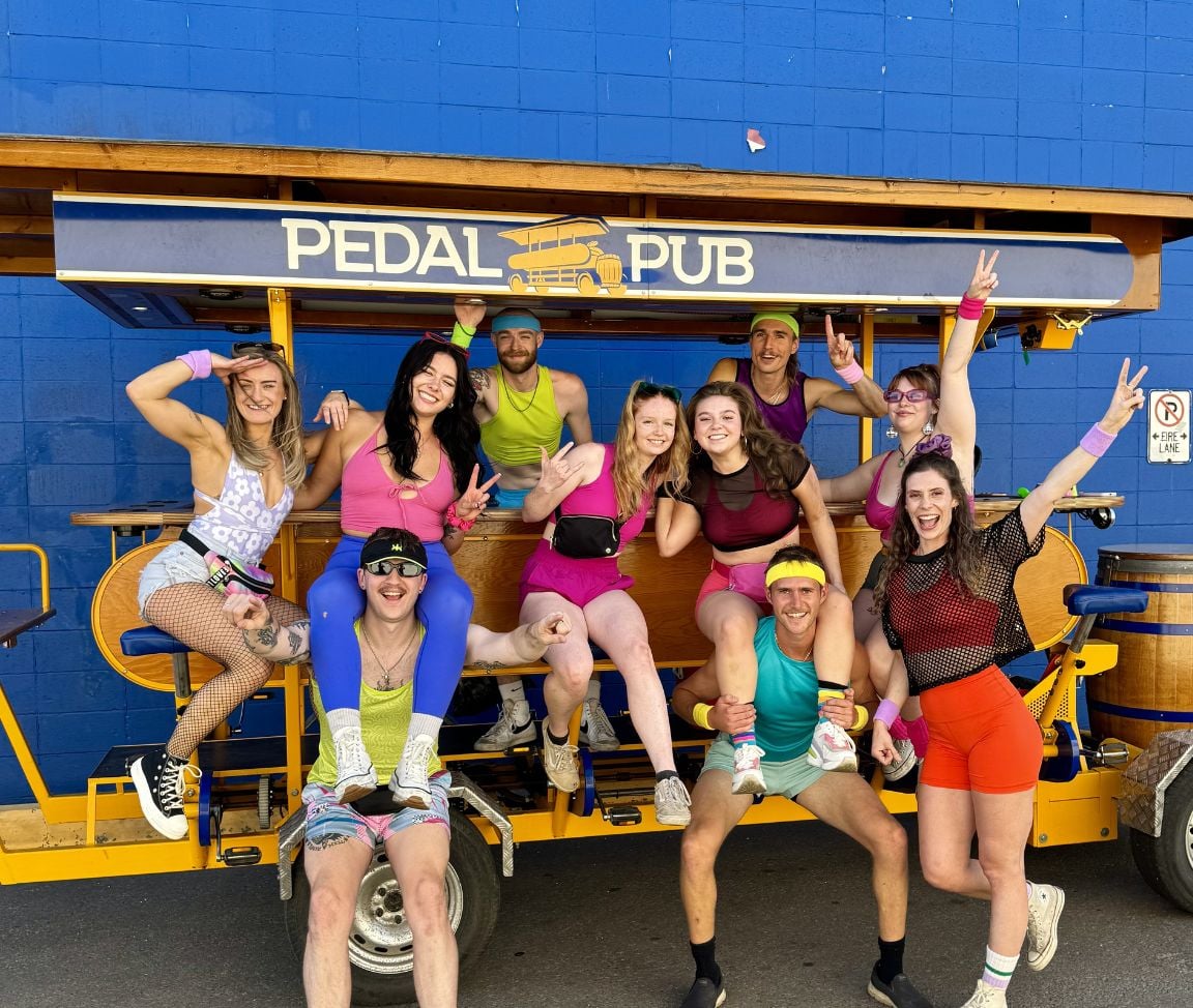 friends posing with Pedal Pub