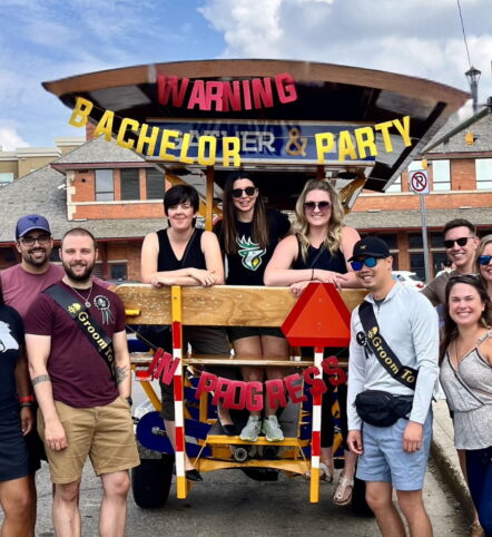 bachelor party celebrating with Pedal Pub