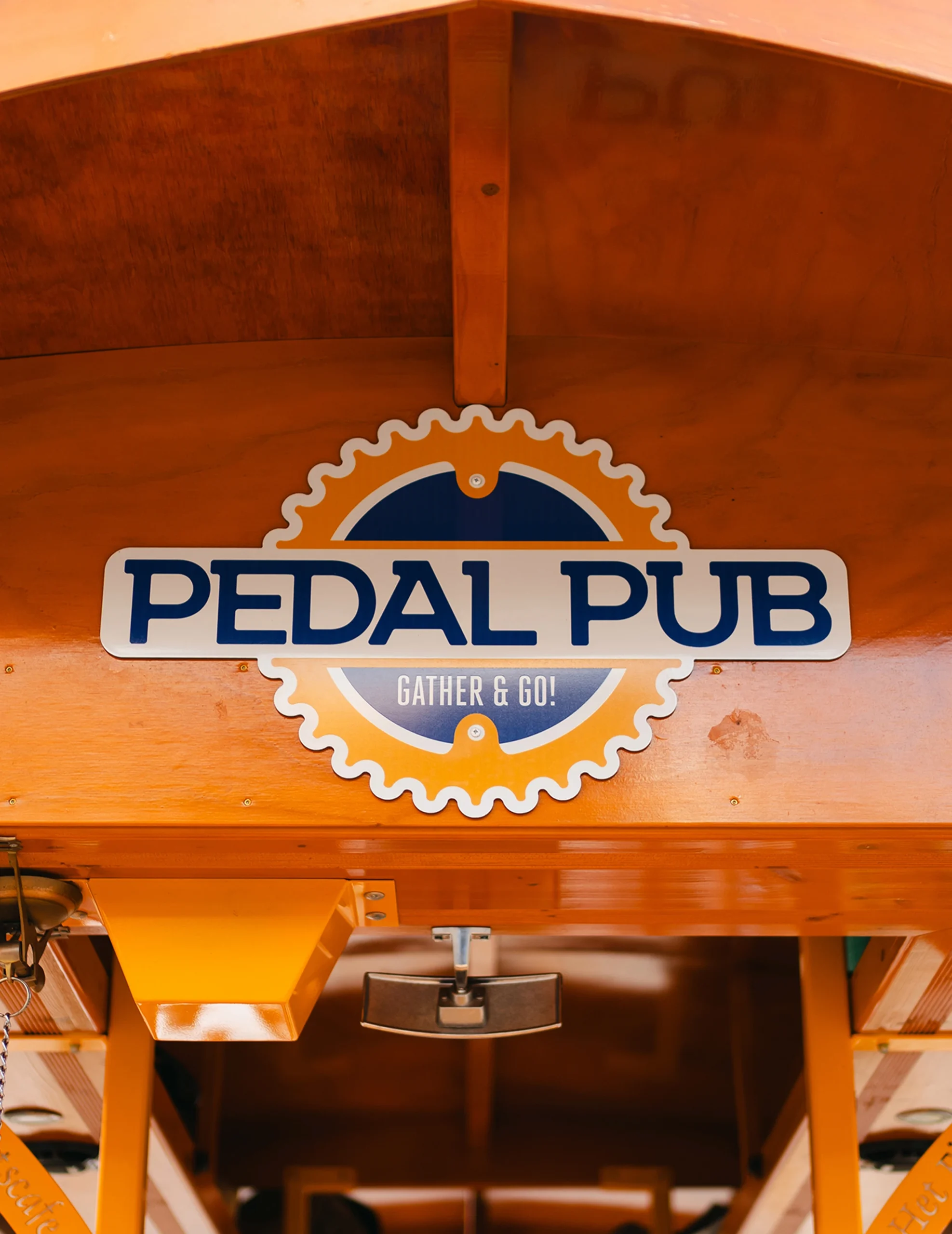closeup of Pedal Pub logo on party bike