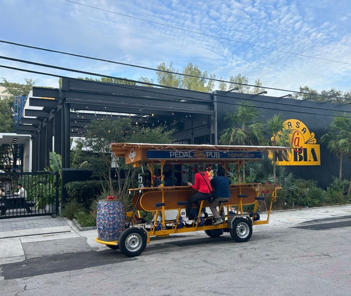 Pedal Pub parked in front of Casa La Rubia