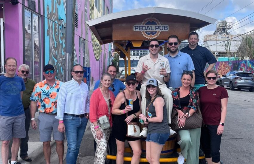 guests around Pedal Pub Miami party bike