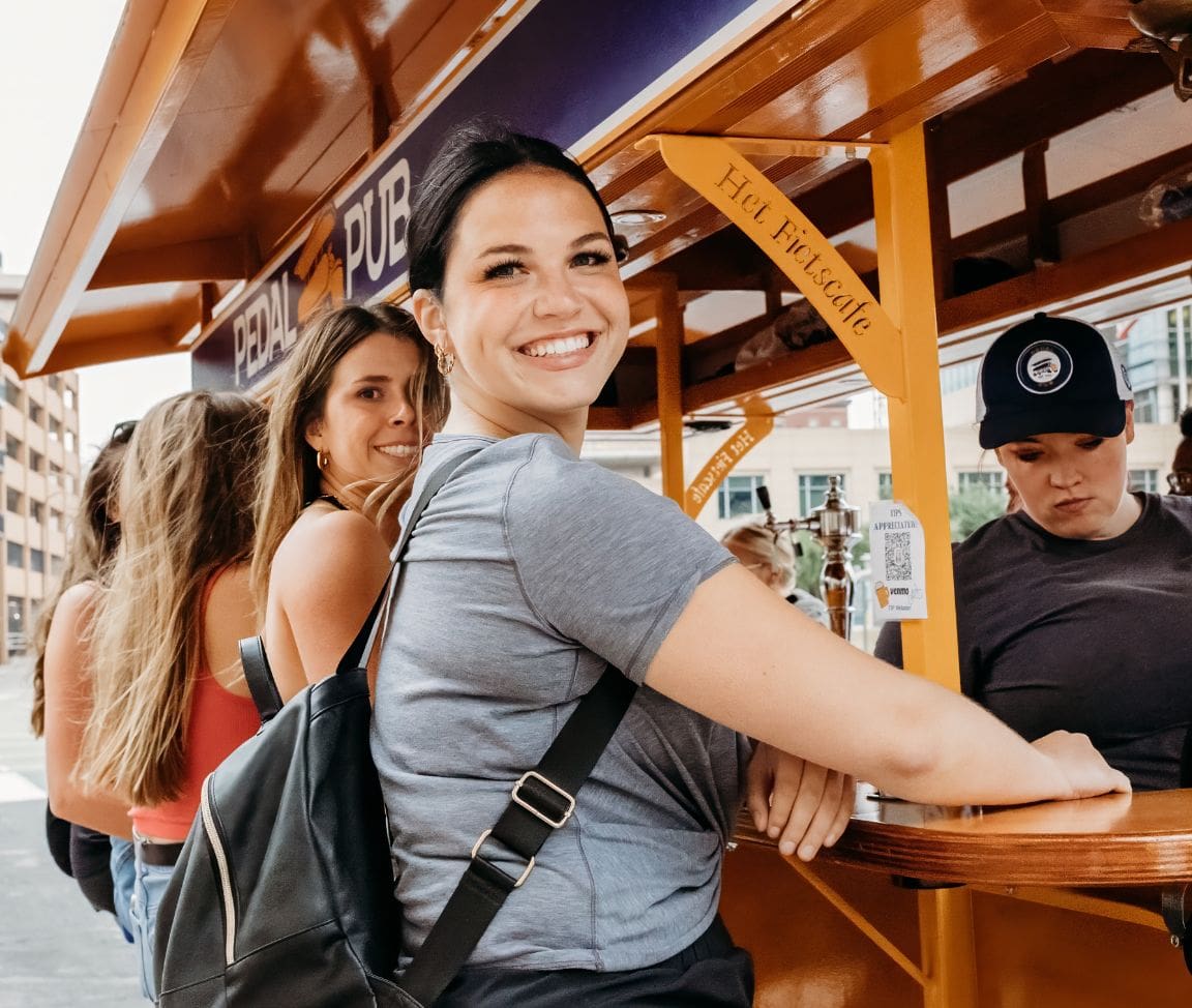 women riding party bike