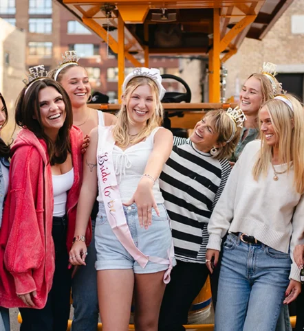 bachelorette party celebrating with Pedal Pub