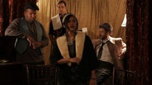 guests dressed up in escape room