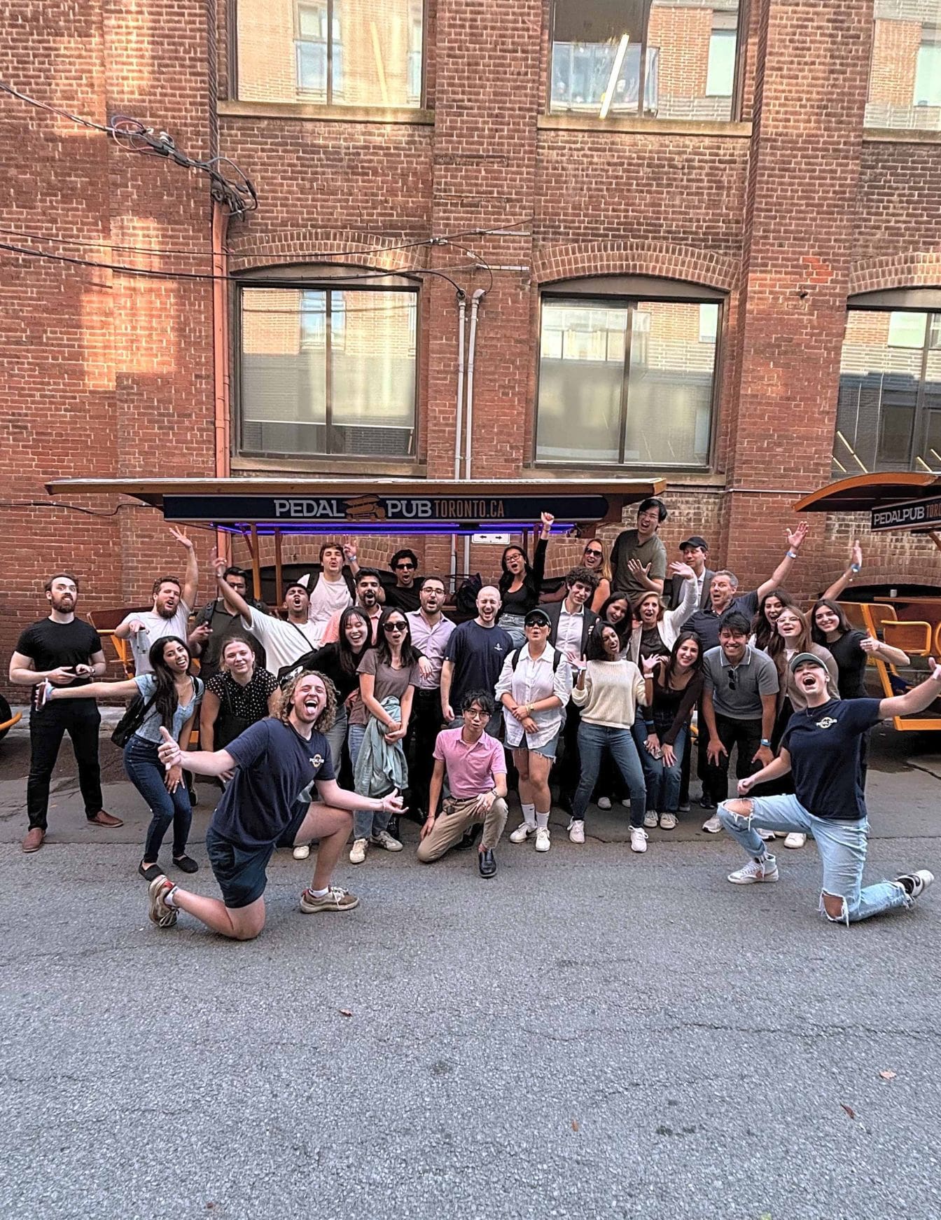 Toronto corporate food tour group on Pedal Pub party bike downtown