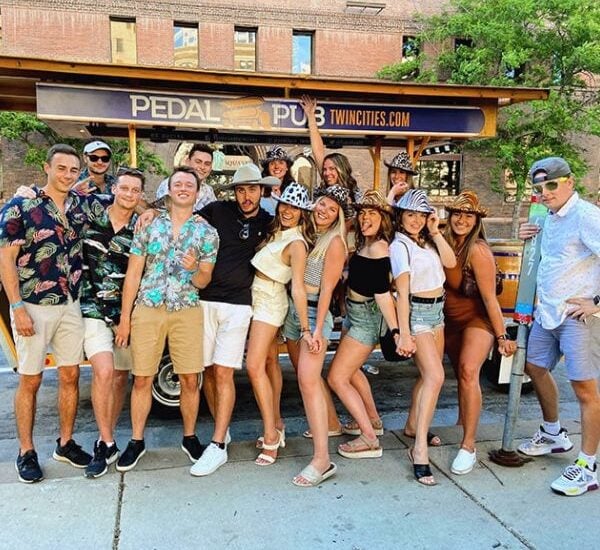 friends exploring Minneapolis on Pedal Pub bike