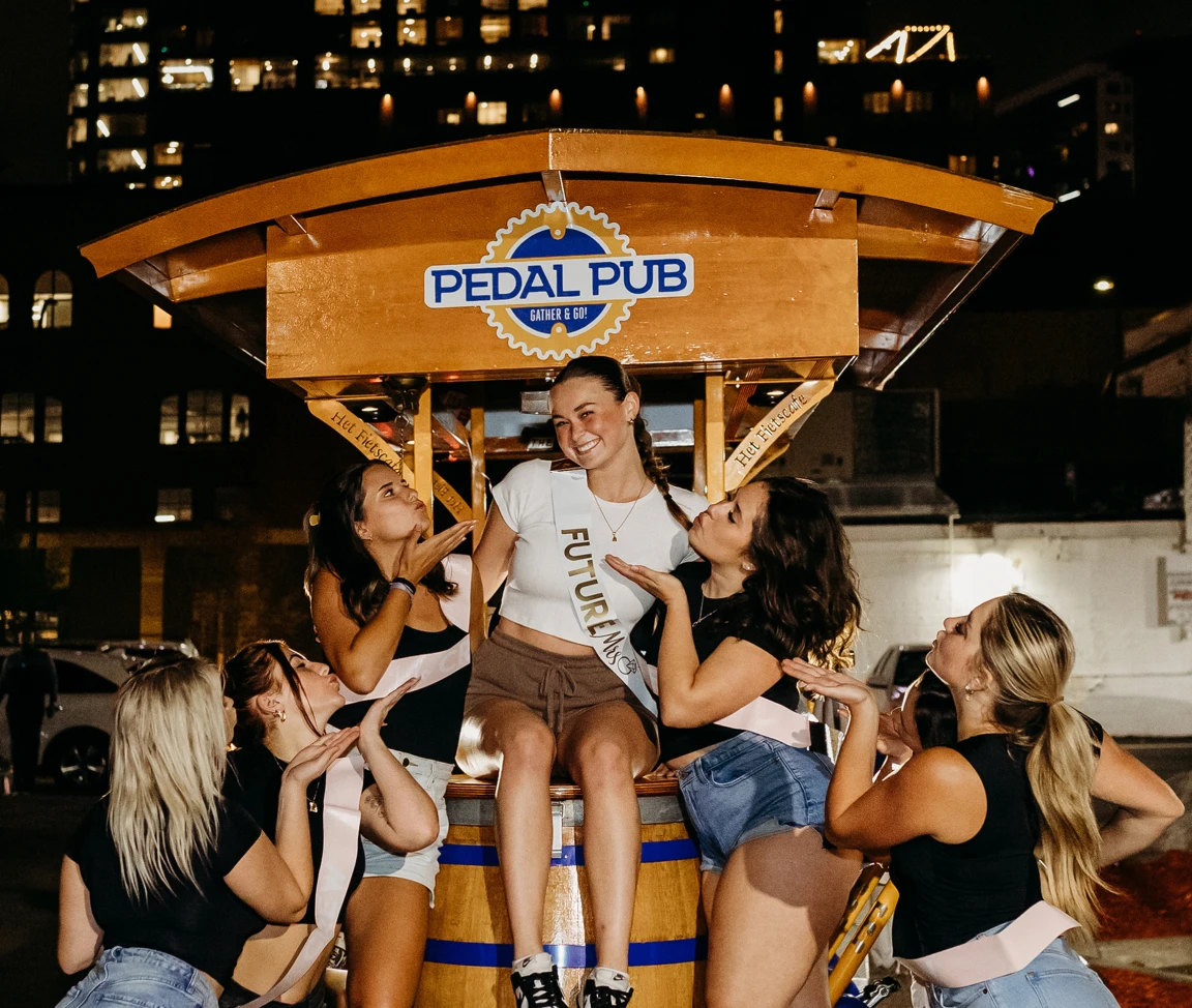 bachelorette party riding a Pedal Pub