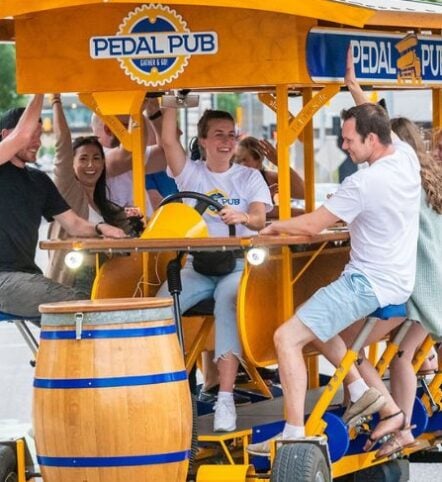 pedal pub driver ringing bell on pedal pub bike