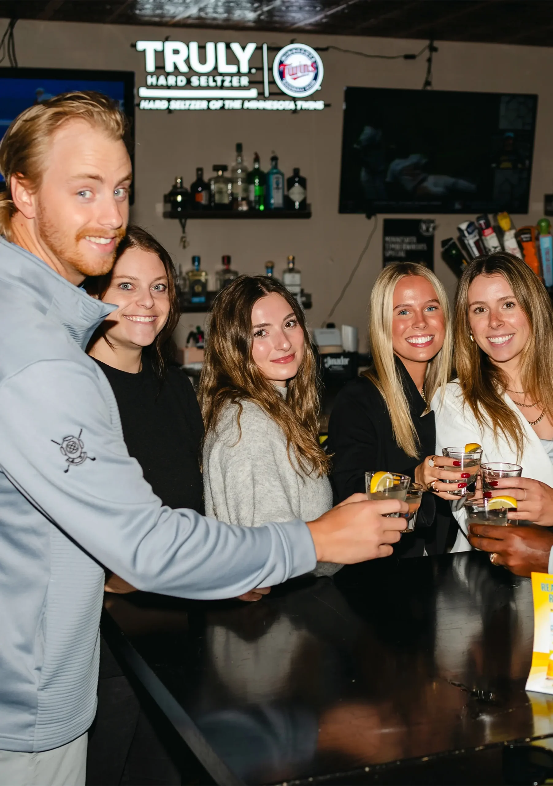 employees on Pedal Pub for company outing